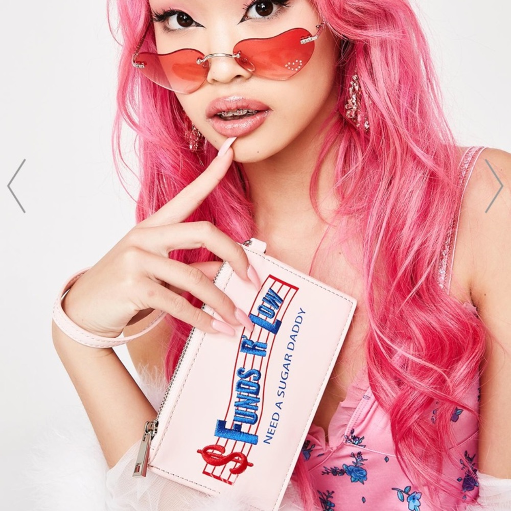 Need sugar wristlet from dolls kill